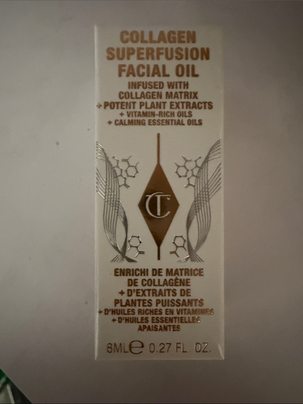 Charlotte Tilbury Facial Oil in White and Gold Packaging